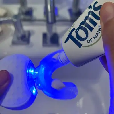 applying toothpaste in 360 Brite